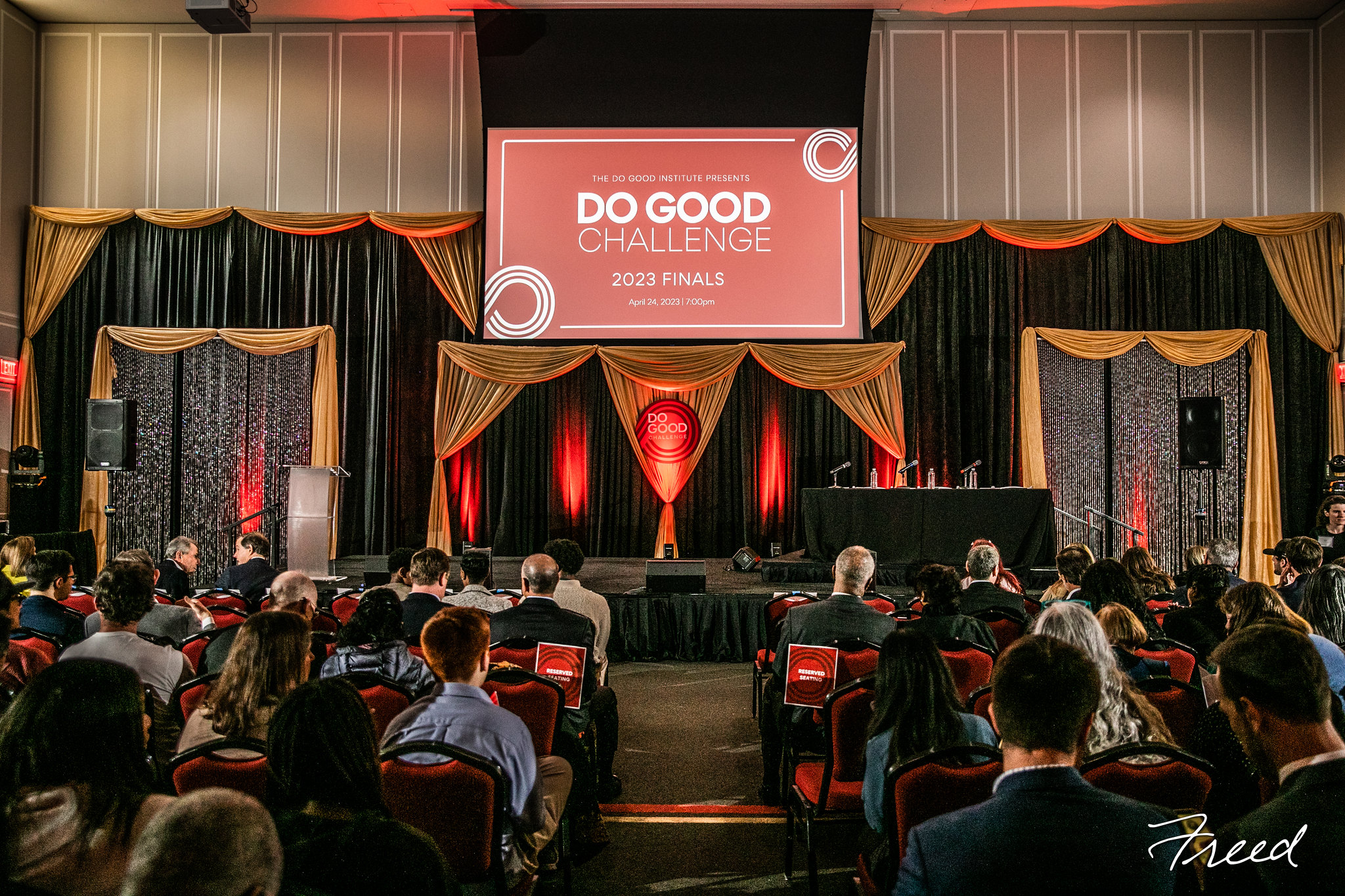 An audience is sitting, waiting for the start of the 2025 Do Good Challenge