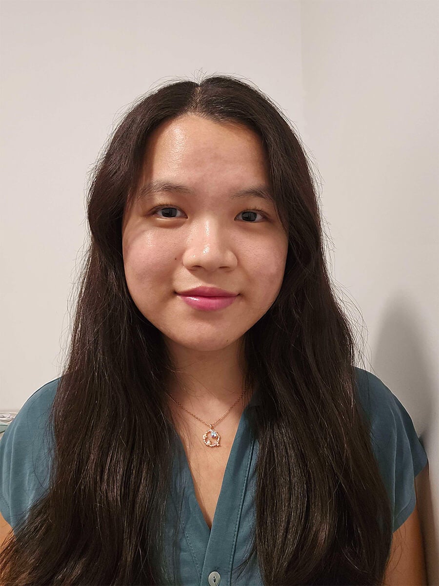 Headshot of student wearing a teal top