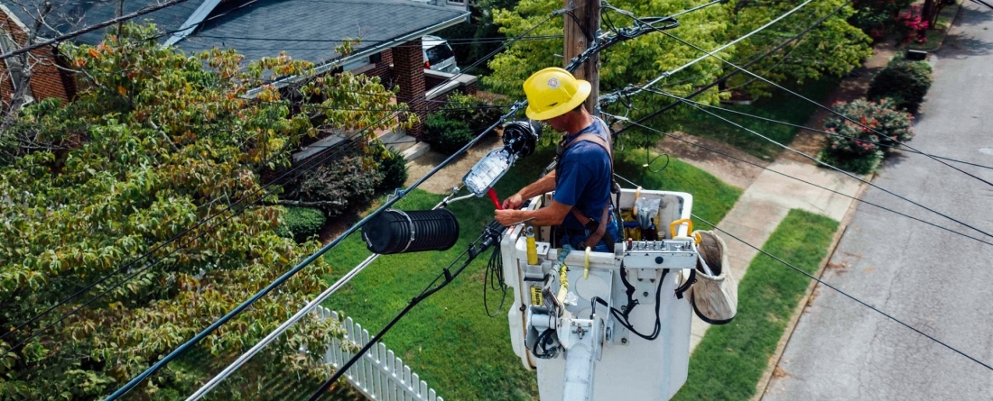 man repairing electrical wires