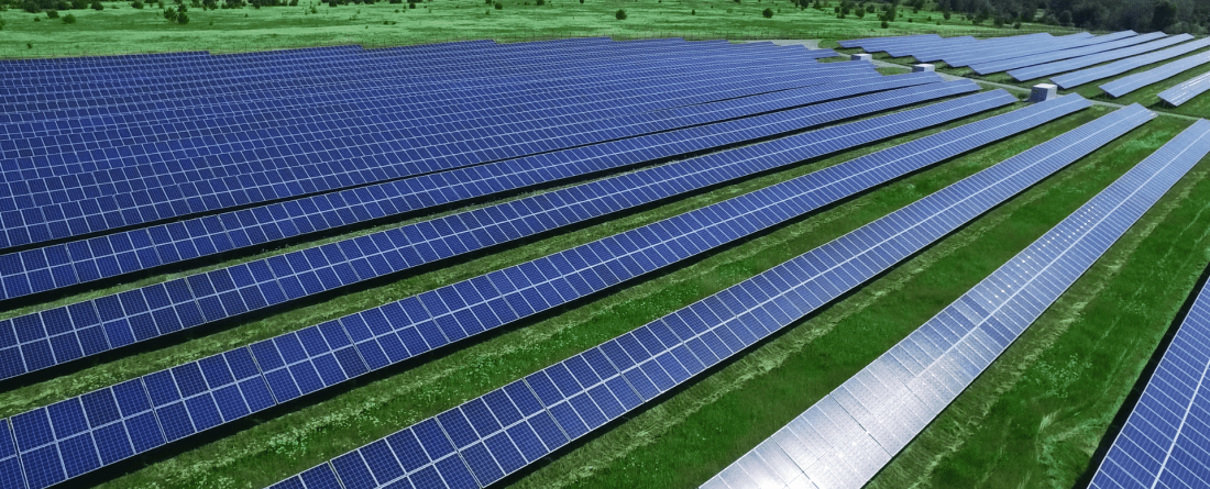 picture of a field with solar panels