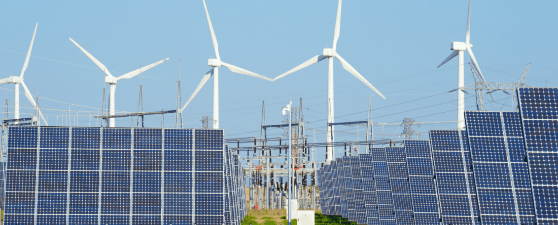 picture of solar panels, windmills, and electricity sector