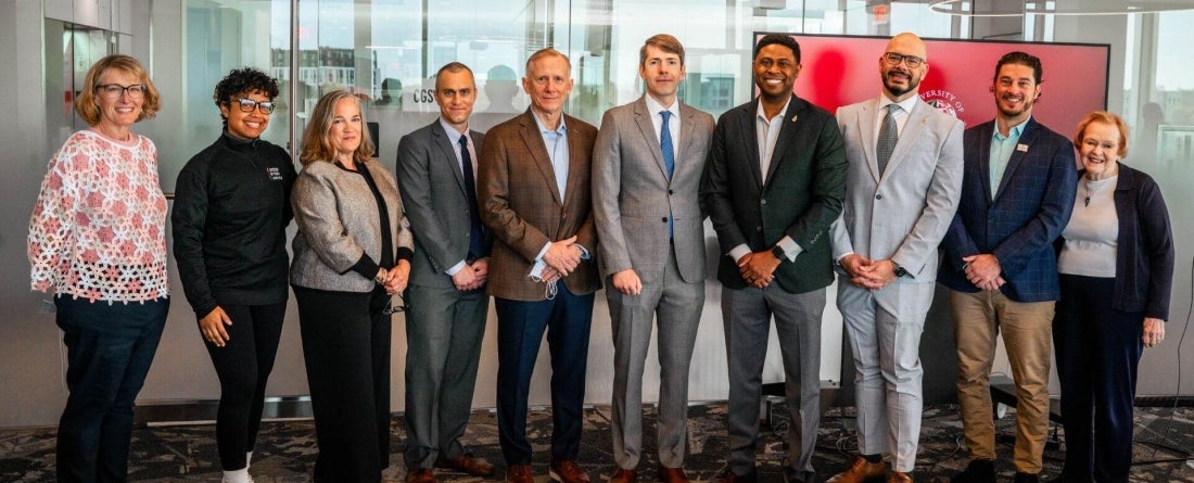 group of people pose for a photo