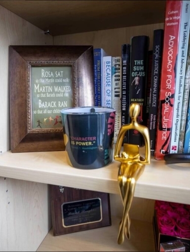 image of shelf in Brandi's office